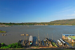 Boats at Mekong river at Khong Chiam with view towards Laos, Province Ubon Ratchathani, Thailand, Asia