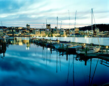 Sailing boats at Chaffers Marina at Lambton Harbour in the evening, view at Central Business District, Wellington, North Island, New Zealand