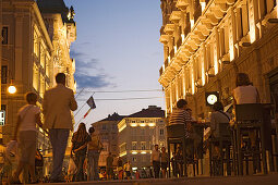 Evening on the Via del Teatro and the Piazza dell'Unita, The bar on the right is called Ex urbanis, Trieste, Friuli-Venezia Giulia, Upper Italy, Italy