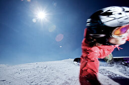 Snowboarder on slope, Kappl, Tyrol, Austria