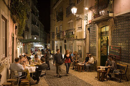 People outside the Alfaia Wine Bar in Bairro Alta District, Lisbon, Lisboa, Portugal, Europe