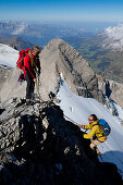 Two mountaineers ascending to summit, Clariden, Canton of Uri, Switzerland