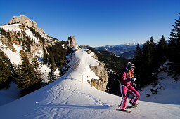 Snowshoeing, Kampenwand, Chiemgau, Bavaria, Germany, model released