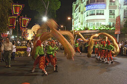 People at dragon dance during Tet festival at night, Saigon, Ho Chi Minh City, Vietnam, Asia