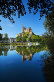 View over Lahn river to Lubentius Church, Dietkirchen, Hesse, Germany