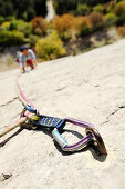 Woman climbing on rock face, Lake Garda, Arco, Trentino-Alto Adige/South Tyrol, Italy