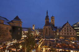 Christmas market at Schiller square, Old Castle and Collegiate Church in the background, Stuttgart, Baden-Wurttemberg, Germany