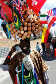 Man with telephone and flags, Football world cup final draw, 04.12.2009, fans celebrate the drawing of the first round, Long street, Capetown, Western Cape, South Africa, Africa