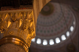 dome and golden column in Yeni or New Mosque, Istanbul, Turkey