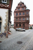 Convertible beside old townhall, Gernsbach, Black Forest, Baden-Wuerttemberg, Germany