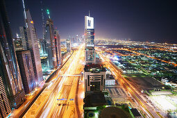 High rise buildings along Sheikh Zayed Road in the evening, Dubai, UAE, United Arab Emirates, Middle East, Asia