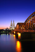 View over the river Rhine towards Cologne cathedral and the Hohenzollern Bridge, Cologne, Rhine river, North Rhine-Westphalia, Germany