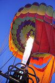 Burner with flash fire filling hot-air balloon, Upper Bavaria, Bavaria, Germany, Europe