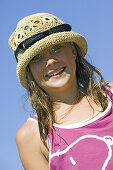 Happy girl with straw hat