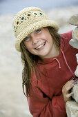 Happy girl with straw hat