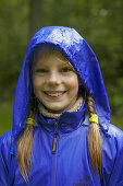 Girl in blue rainjacket
