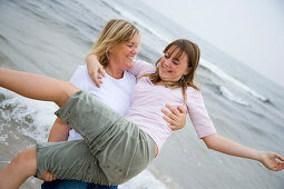 Women playing on beach