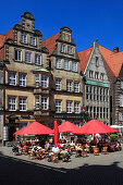 Historical houses and sidewalk cafes at the market square under blue sky, Hanseatic City of Bremen, Germany, Europe