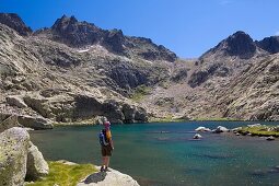 Cinco Lagunas Valley  Garganta del Pinar  Woman practice mountaineering in the mountains of the Sierra de Gredos National Park  Zapardiel de la Ribera  Ávila  Castilla y León  Spain