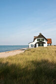 Haus am Strand der Halbinsel Graswarder, Heiligenhafen, Ostsee, Schleswig-Holstein, Deutschland