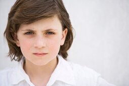blue eyes, boy, brown hair, Caucasian ethnicity, chestnut hair, child, clipping path, Close-up, Color image, contemporary, face, headshot, horizontal, human, kid, looking at camera, Male, one, one person, people, portrait, pre-teen, serious, seriousness, 