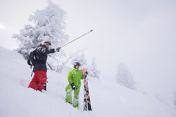 Male free skiers in deep snow, Mayrhofen, Ziller river valley, Tyrol, Austria