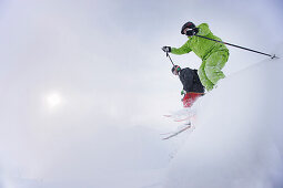 Male free skiers in deep snow, Mayrhofen, Ziller river valley, Tyrol, Austria