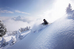 Male free skier in deep snow, Mayrhofen, Ziller river valley, Tyrol, Austria