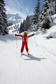 Child schuss skiing, glide path ski region Heuberg, Hirschegg, Kleinwalsertal, Vorarlberg, Austria
