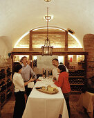 Wine tasting in the wine cellar of organic Hotel Chesa Valisa, Hirschegg, Kleinwalsertal, Austria