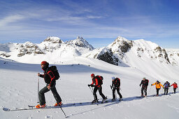 Ski mountaineers on their way to Tiz Tasner, Engadin, Grisons, Switzerland, Europe