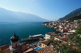 Excursion boat, Church, view over Limone, Lake Garda, Lombardy, Italy