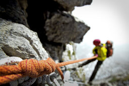 Climber abseiling, Schilthorn, Bernese Oberland, Canton of Bern, Switzerland