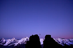 Man walking a highline between two rocks, Schilthorn, Bernese Oberland, Canton of Bern, Switzerland