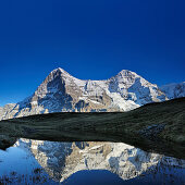 Eiger und Mönch spiegeln sich in See, Kleine Scheidegg, Grindelwald, UNESCO Welterbe Schweizer Alpen Jungfrau - Aletsch, Berner Oberland, Bern, Schweiz, Europa