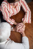 Senior and mature women holding hands, Zurich, Switzerland