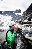 Mountaineer at north ridge, Acherkogel, Stubai Alps, Tyrol, Austria