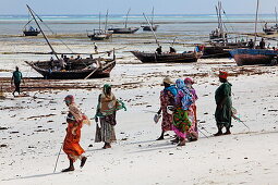 Local people on the beach at Nungwi village, Nungwi, Zanzibar, Tanzania, Africa