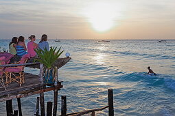 People on the terrace of the Z Hotel at sunset, Nungwi, Zanzibar, Tanzania, Africa