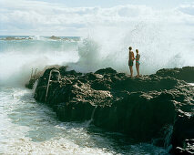 Surf and cliffs near Mosteiros, western shore of Sao Miguel island, Azores, Portugal