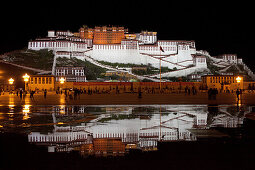 Potala Palace at night, residence and government seat of the Dalai Lamas in Lhasa, Tibet Autonomous Region, People's Republic of China