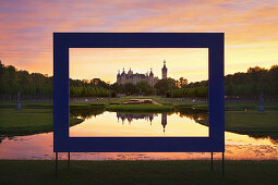 View through a frame to Schwerin Castle, Schwerin, Mecklenburg-Western Pomerania, Germany