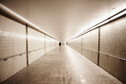 Lone Person in Long Tunnel