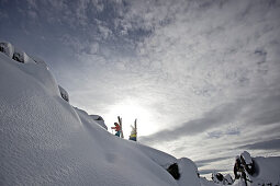 Two skiers ascending, Chandolin, Anniviers, Valais, Switzerland