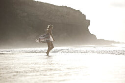 Young woman at beach, Fuerteventura, Spain