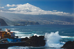 Breakers at the village of El Pris, coastline, valley of Orotava, view to Teide 3718m, the islands  landmark, country high point, volcanic mountain, Tenerife, Canary Islands, Spain, Europe