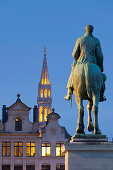 Equestrian monument and illuminated steeple in the evening, Statue du roi Albert, Place de L'Albertine, Brussels, Belgium, Europe