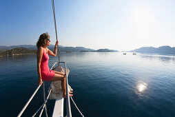 Woman on sailing boat at lykian coast, Mediterranean Sea, Turkey, Europe