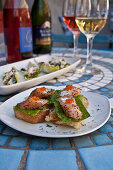 Smoked salmon rolls with goat cheese, dill and salmon caviar on crostini, Restaurant Fork, Cape Town, Western Cape, South Africa