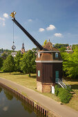 View of crane Saarkran at the river Saar in the sunlight, Saarbruecken, Saarland, Germany, Europe